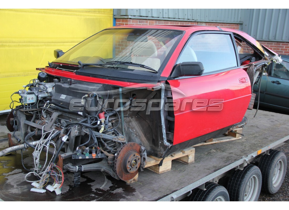 Ferrari Mondial 3.4 t Coupe/Cabrio getting ready to be stripped for parts at Eurospares