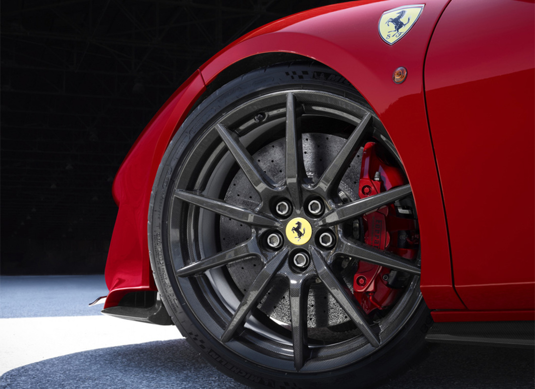 new ferrari carbon wheels kit with tyres & titanium bolts. part number 70005177 (1)