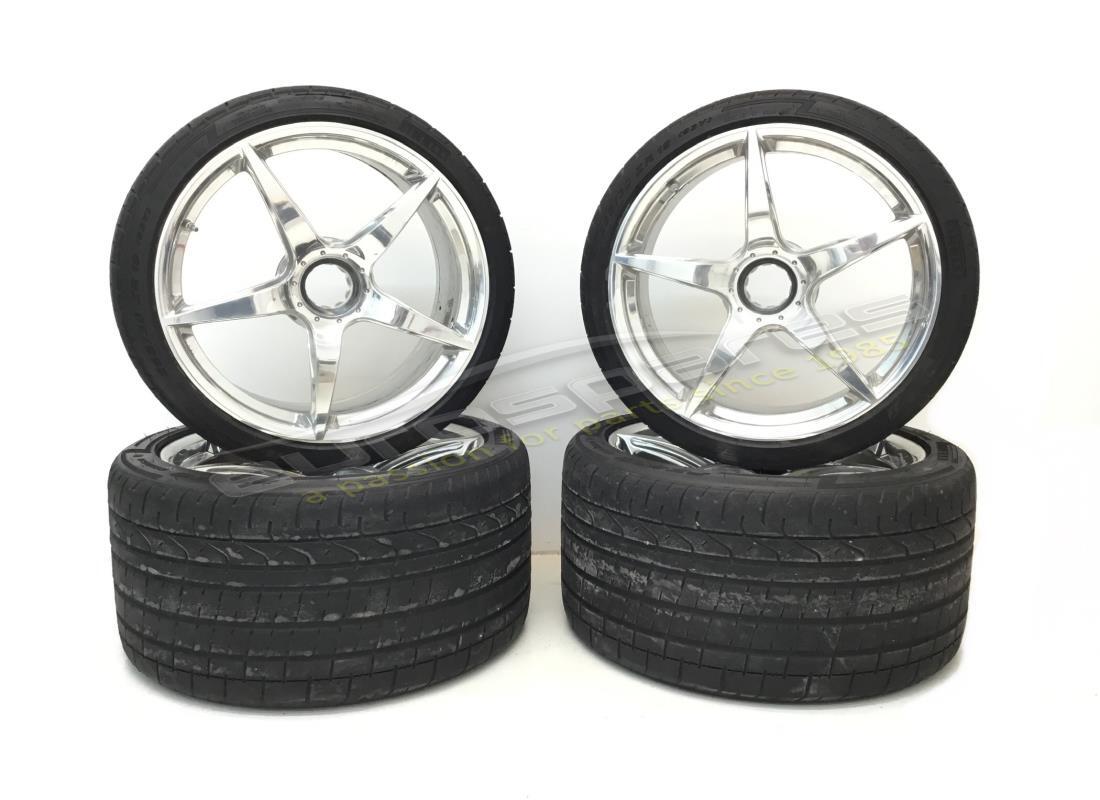 USED Ferrari BLACK RIMS SET . PART NUMBER 70003494 (1)