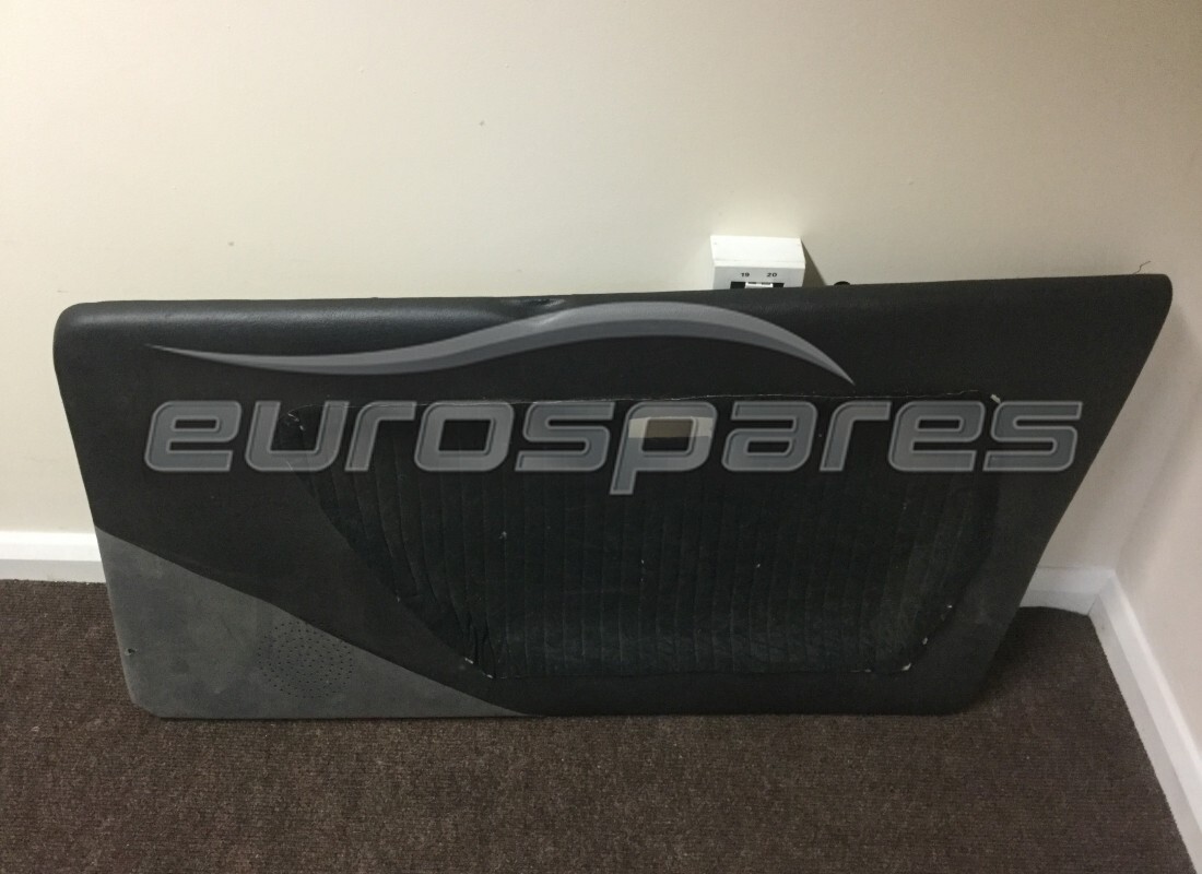 new ferrari rh int door panel black. part number 40285603 (1)