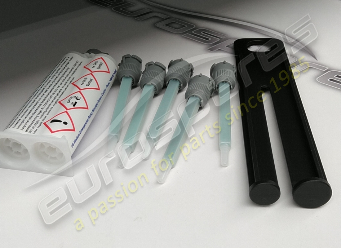 new porsche adhesive set. part number 4330653 (1)