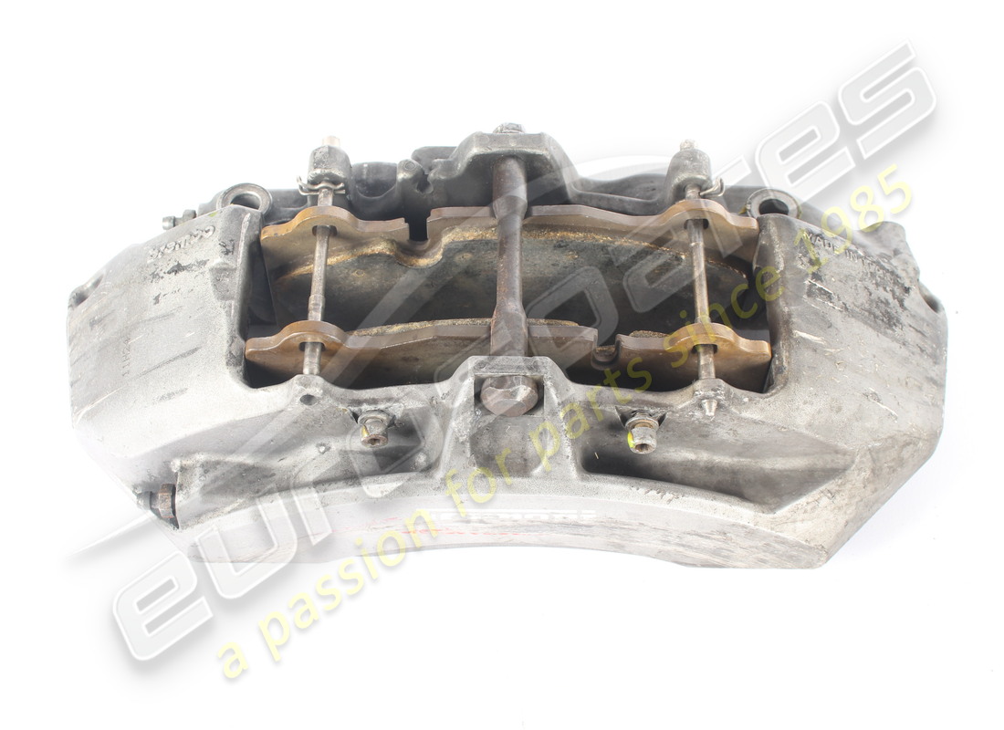 used ferrari front lh caliper with pads part number 267003